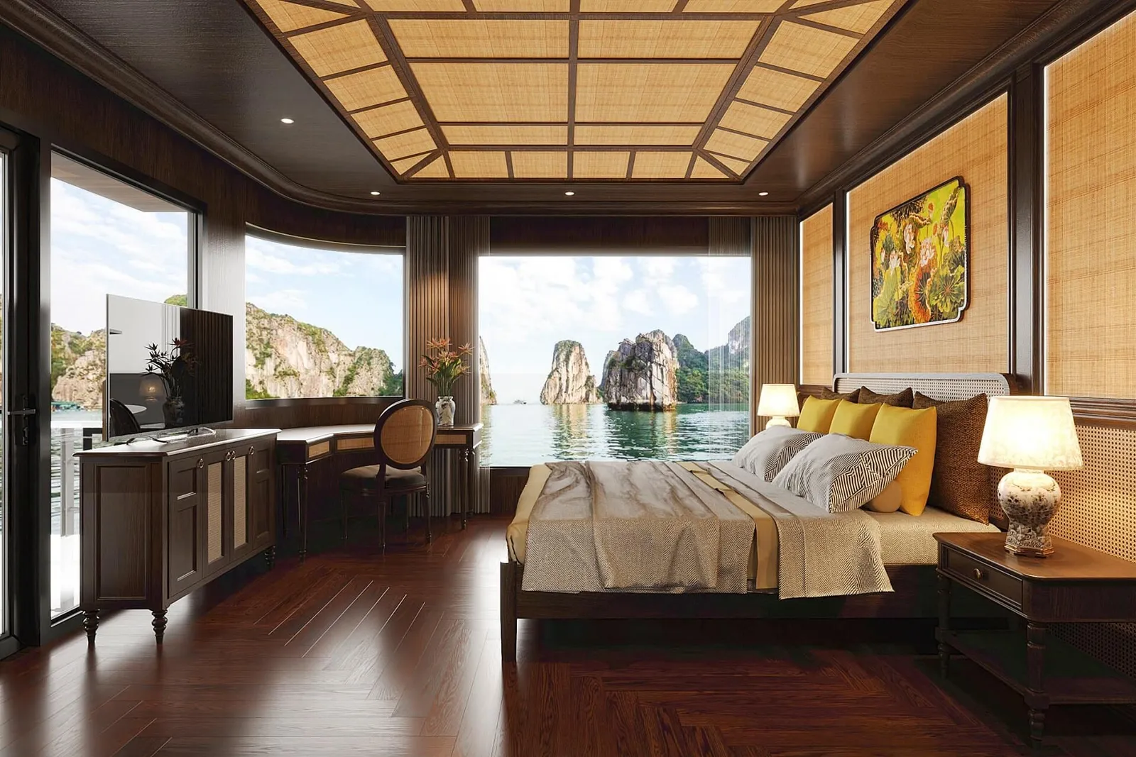A luxury cabin interior with a bed, desk, and large windows showing limestone karsts rising from green water.